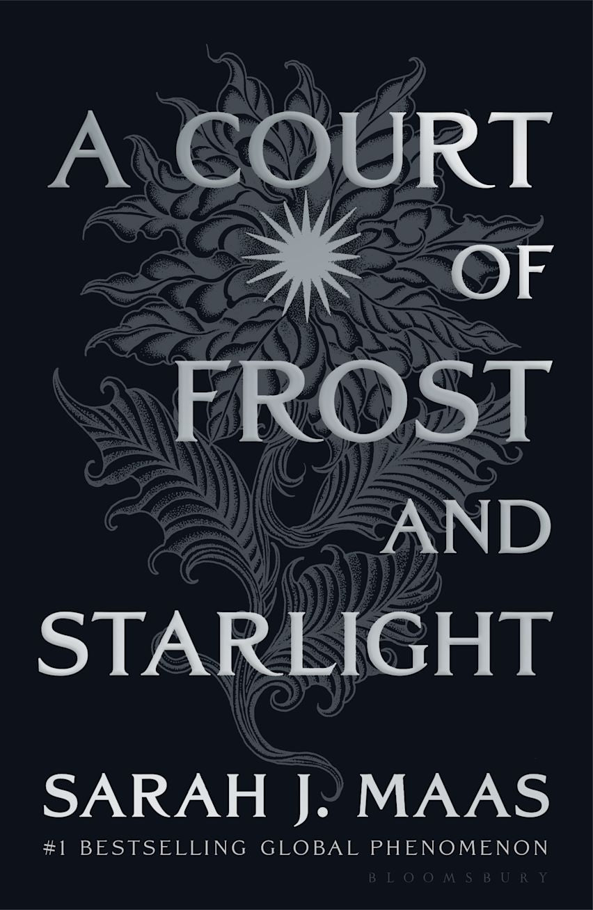 Book cover of 'A Court of Frost and Starlight' by Sarah J. Maas with intricate design on a black background.