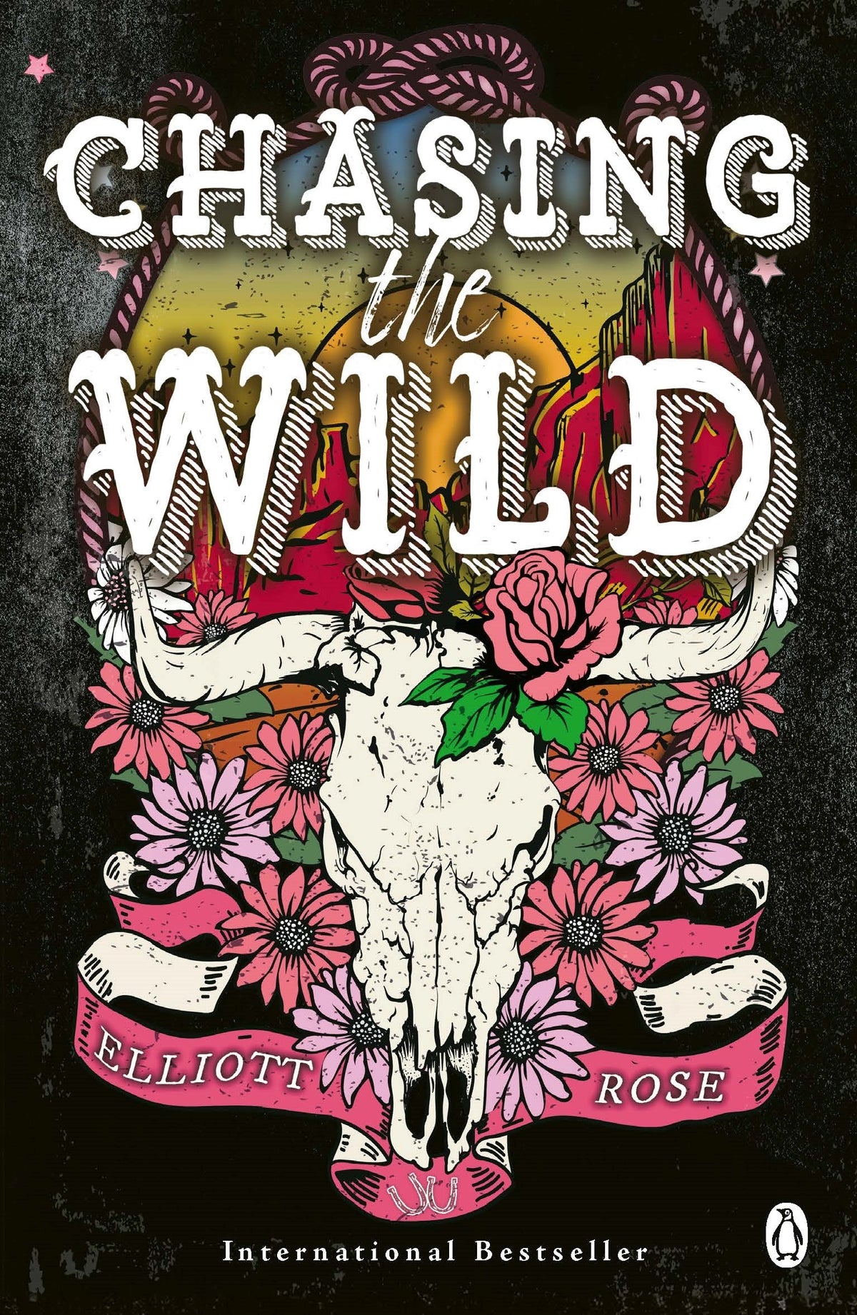 Book cover of 'Chasing the Wild' with a skull, flowers, and text on a dark background