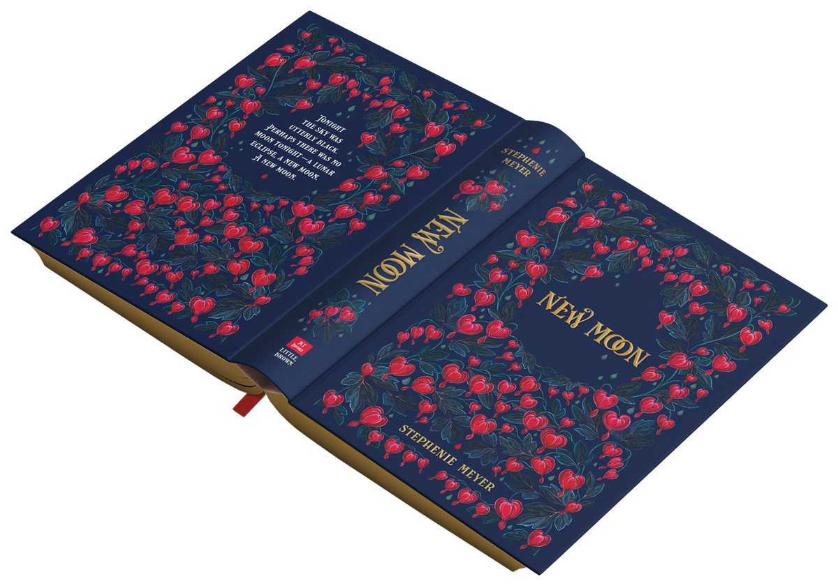 Book titled 'New Moon' with floral design on a white background