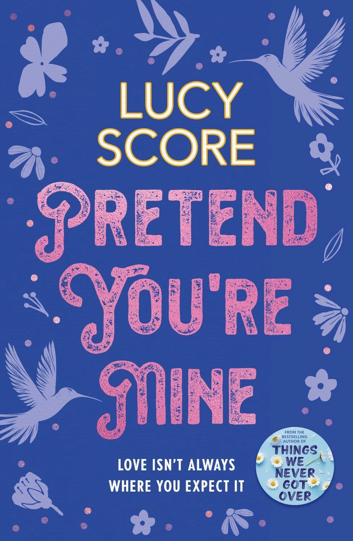 Book cover of 'Pretend You're Mine' with a blue background and decorative elements of birds and flowers 
