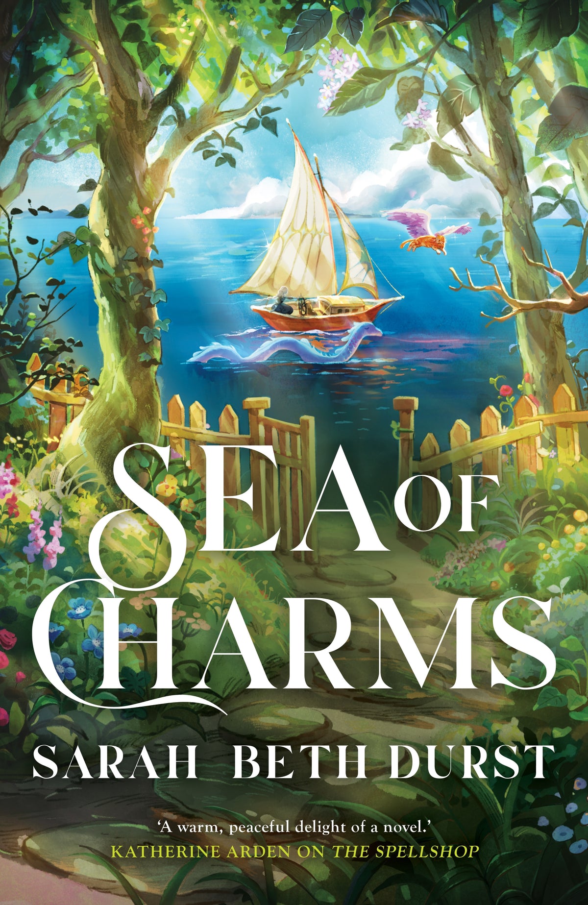 Book cover for 'Sea of Charms' by Sarah Beth Durst featuring a whimsical illustration of a sailboat on a blue sea framed by lush green trees and a wooden fence