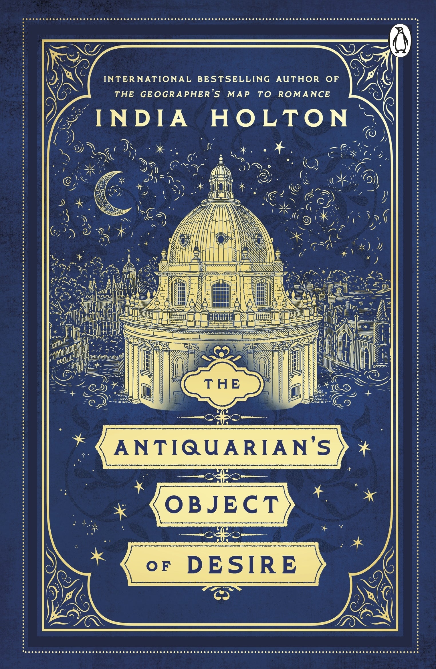 Book cover of 'The Antiquarian's Object of Desire' by India Holton with architectural illustration and blue background.