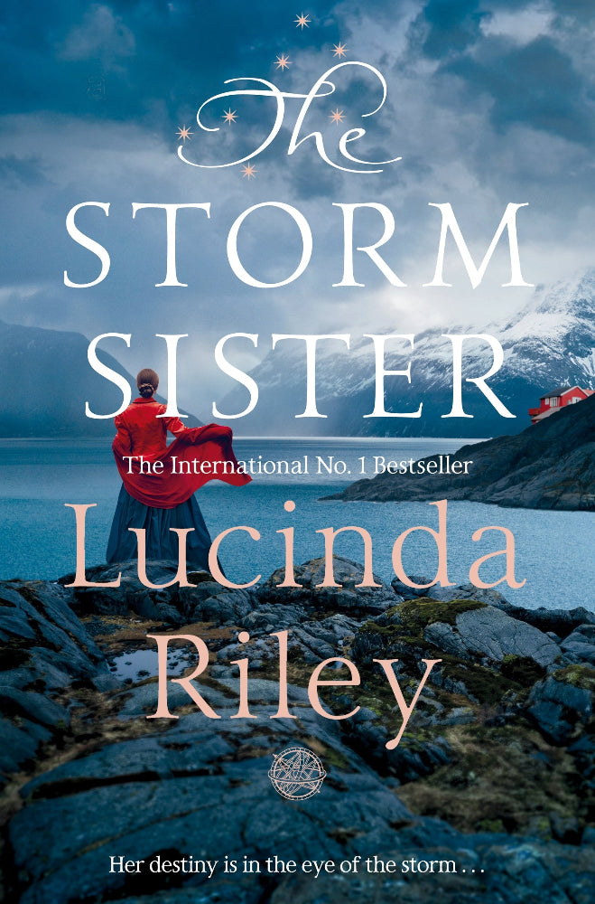 Book cover of 'The Storm Sister' features a woman in a red coat standing by a stormy sea