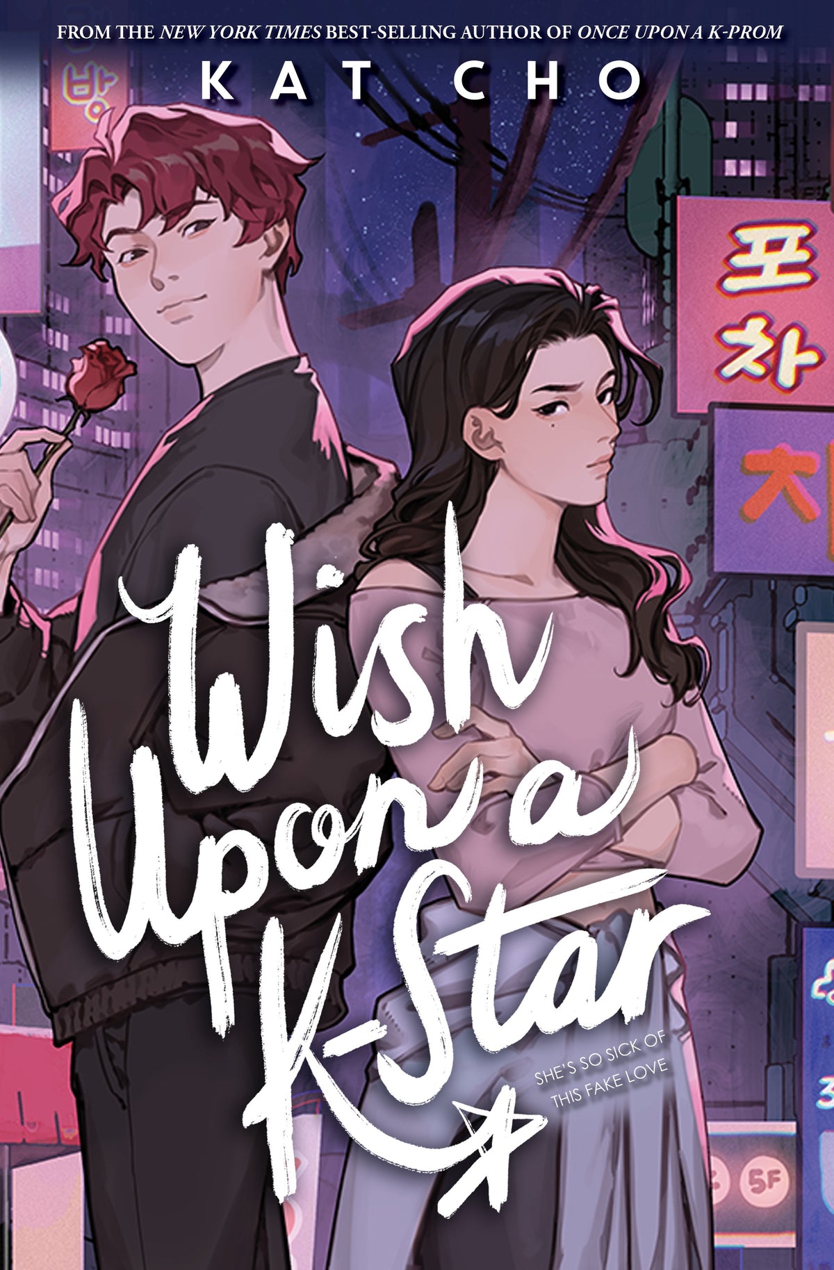 Book cover of 'Wish Upon a K-Star' with two characters back to back and a cityscape background